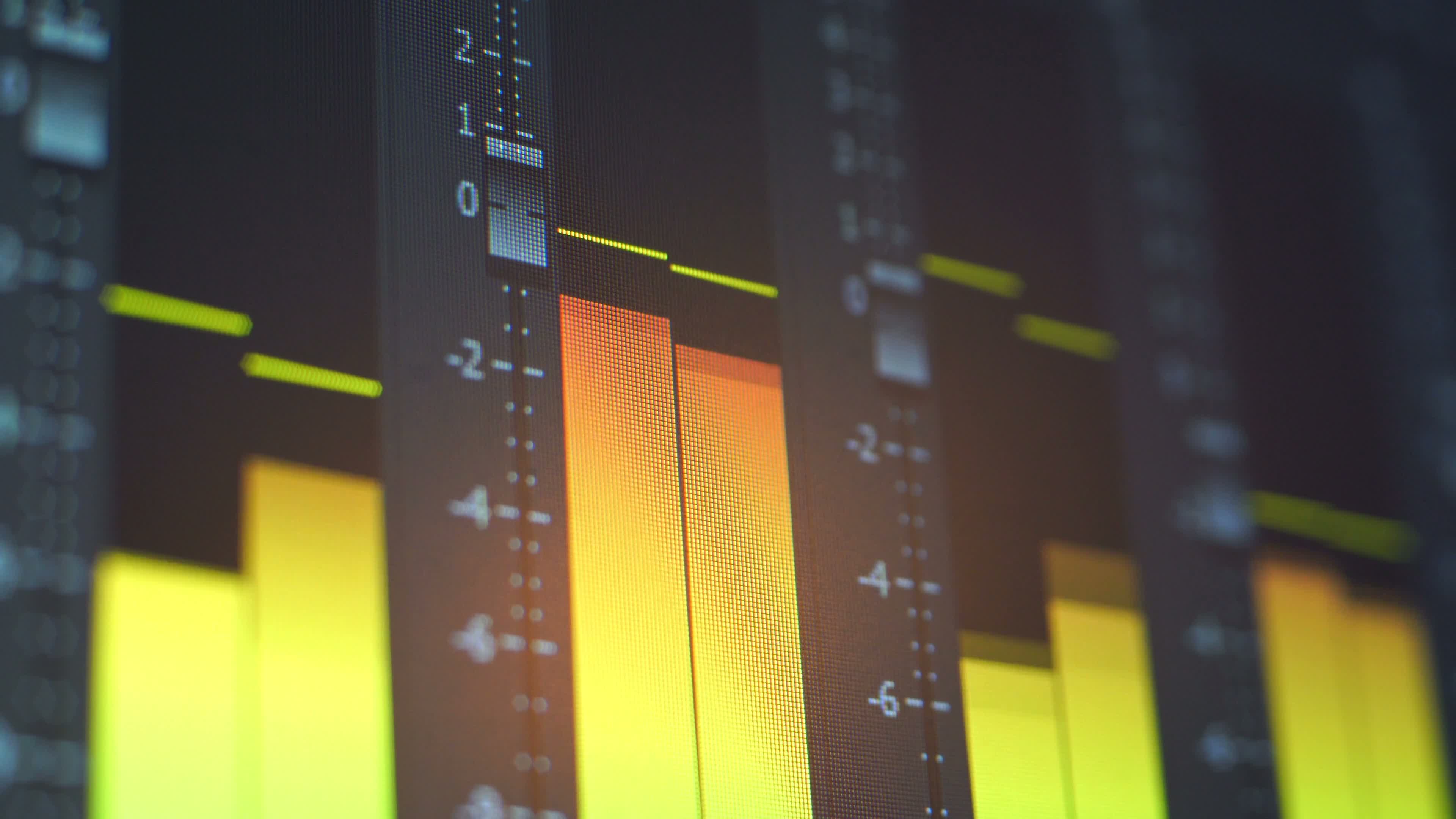 Close-up audio equalizer glowing in yellow and orange, representing a distinctive brand voice